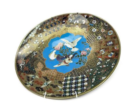 JAPANESE CLOISONNE ENAMEL CIRCULAR PLAQUE, early 20th century, decorated with birds and flowers, 30.5cm diameter