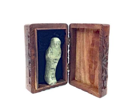 EGYPTIAN AMUN-HOTEP PAINTED SHABTI, ceramic shabti in a gritty grey green fabric, with detailed headdress and foldd arms, eye