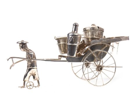 CHINESE SILVER RICKSHAW CRUET, modelled as a man pulling a rickshaw with salt, pepper and mustard dishes, unmarked, 24cm long
