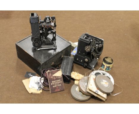 A VINTAGE PATHESCOPE REEL TO REEL FILM PROJECTOR, contained in box, together with a Specto projector and reels etc. Buyers - 