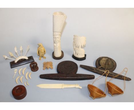 A COLLECTION OF TRIBAL ITEMS ETC., to include Chinese opium scales, Inuit Penguin, African carved spill vase, and a letter op