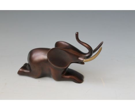 A LOET VANDERVEEN BRONZE SEATED ELEPHANT FIGURE, limited edition, boxed Buyers - for shipping pricing on this lot, visit www.