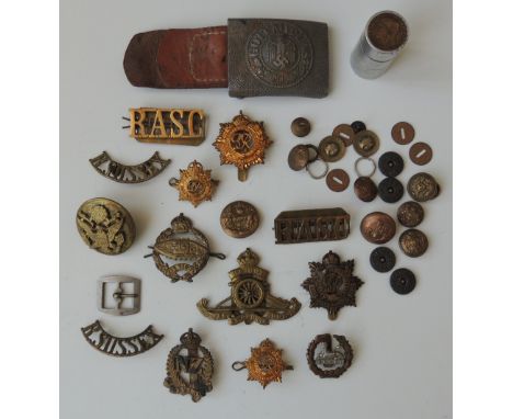 A COLLECTION OF MILITARY BADGES AND INSIGNIA, to include a German Third Reich military buckle, various 'RASC' badges etc., to