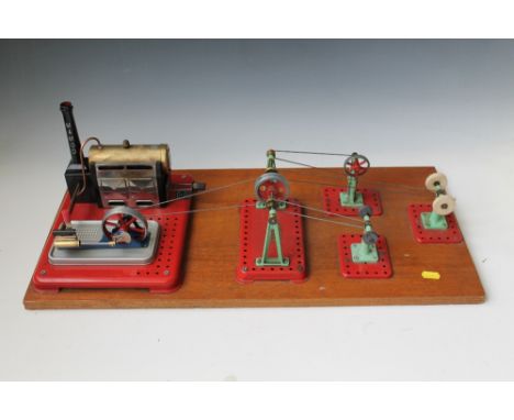 A MAMOD 'STEAM PLANT' AND ACCESSORIES, to include a single boiler and drive wheel linked to a line shaft, and three power too