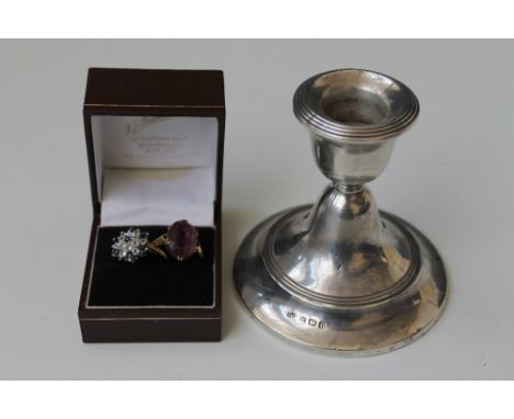 A SMALL HALLMARKED SILVER DWARF CANDLESTICK, bearing Birmingham hallmarks, H 8 cm, together with a 9ct ring and a dress ring 