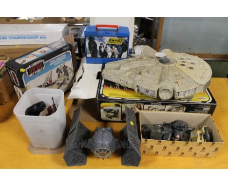 A QUANTITY OF STAR WARS TOYS, consisting of a boxed millennium falcon and snowspeeder tie fighter and figures etc., all playw