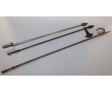 TWO INDO PERSIAN IRON HAND ARMS, one in the form of an axe and the other a hook, along with a reproduction socketed leaf bayo