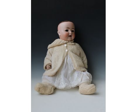 A GERMAN BISQUE HEADED PORZELLANFABRIK-BURRGRUB CHARACTER DOLL, marked to the back of the head '169 7 Germany', composition j