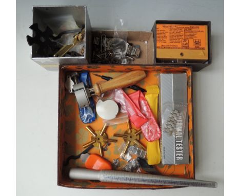 A BOX OF ASSORTED WATCH AND CLOCK KEYS, together with a small quantity of watch maker's tools Buyers - for shipping pricing o