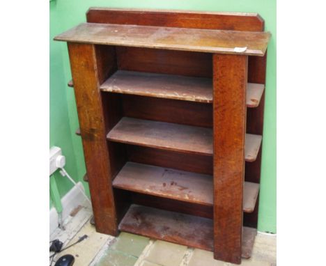 An Arts and Craft oak open book shelf, with open shelves to ends, 99cm high, 76cm wide, 21.5cm deep, c.1910