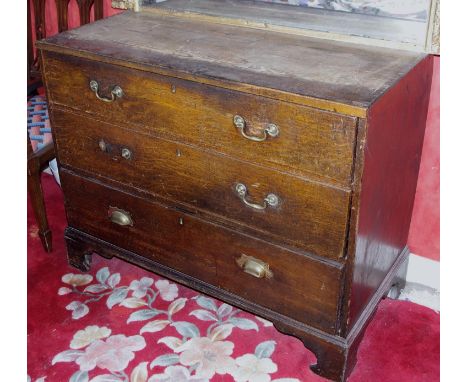 A 19th century oak chest, of three long drawers, bracket feet, 86m high, 108cm wide, 52cm deep, c.1800