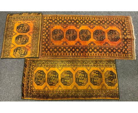 A Hand made Persian runner, central panel of five geometric medallions, within four different border surround, burnt orange g