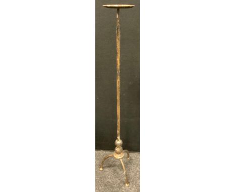 A tall, floor standing pricket candlestick, 101cm high 
