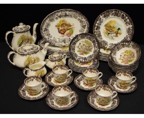 A Royal Worcester Palissy Game Birds series pattern dinner service inc oval and round dinner plates, side plates, bowls, tea 