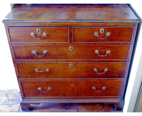 A George III oak chest, of two short and three long graduated cockbeaded long drawers, brass swan neck handles, bracket feet,