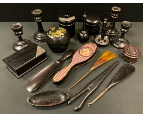 An extensive matched ebony dressing table set, part silver mounted inc ring tree, hair tidy, two pairs of candlesticks, trink