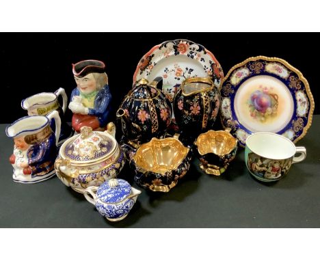 An Ironstone plate; a Derby porcelain cream jug and cover; a Royal Worcester plate; a 19th century sucrier and cover; Toby ju