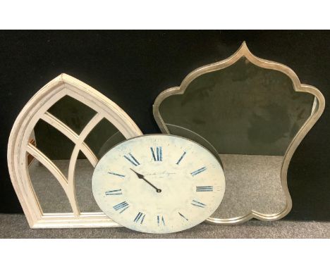 A 'Gothic' white painted mirror, 80cm x 62cm;  another, silvered, cartouche shape, 91cm x 61cm; a modern wall clock (3) 