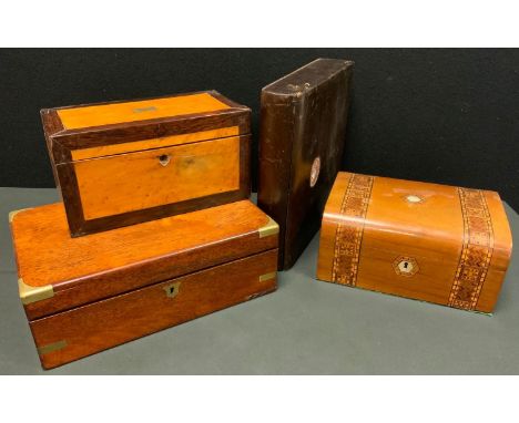 An early 19th century rosewood and birds eye maple tea caddy, two section fitted interior;  a Victorian brass bound writing s