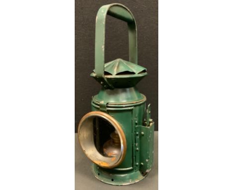 A World War II period green painted military issue Railway guardsman's lamp, by C Eastgate &amp; Sons, Birmingham, military i
