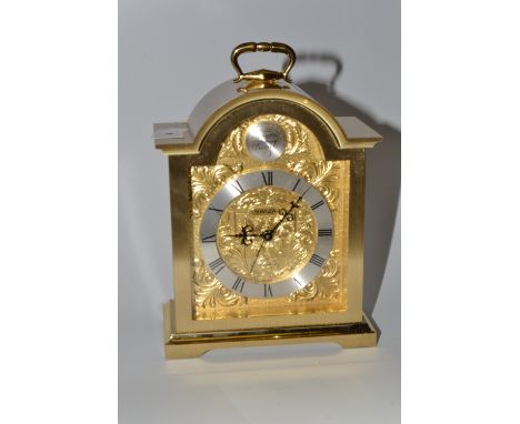 A Swiza brass carriage clock, Roman numerals to the dial, boxed