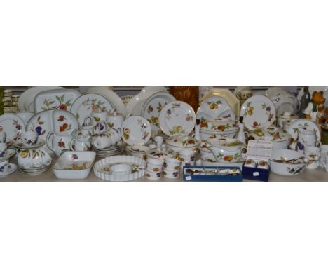 An extensive collection of Royal Worcester Evesham pattern dinner ware, consisting of plates, storage jars, serving dishes, t