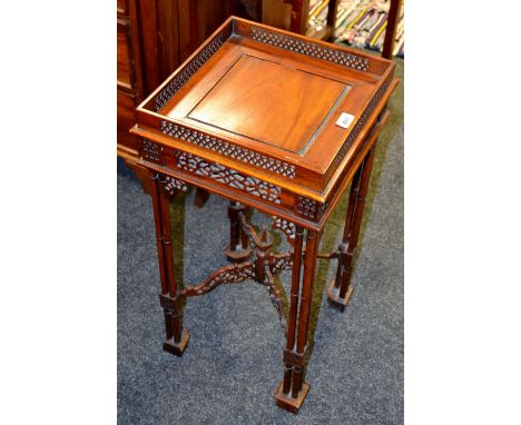 A Chinese Chippendale style, mahogany wine table, pierced gallery and frieze, triple cluster columns