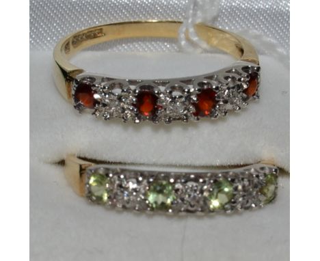 A 9ct gold, diamond and ruby dress ring; another, with peridot (2)