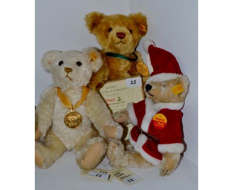 A Steiff Millennium bear 2000; another 2001; a Steiff Christmas bear; limited edition