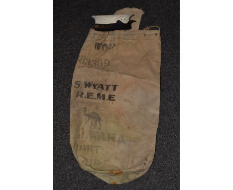 A sailor's cap, band for H.M.S. Blake; a sailor's canvas kit bag (2)

HMS Blake (1945-1979) was a light cruiser of the Tiger 