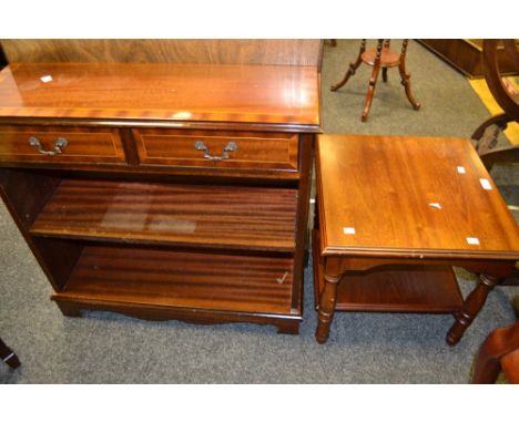 A reproduction mahogany bookshelf, two drawers over open shelf, shaped apron, bracket feet;   a mahogany side table