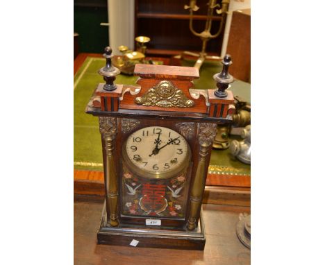 A mid-20th century Chinese mantel clock, of Viennese form, the 13m silvered dial with Arabic numerals, the eight day movement