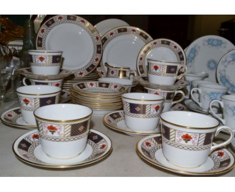 A Royal Crown Derby Derby Borders pattern tea service, for eight, comprising teacups, saucers, side plates, side dishes, dess