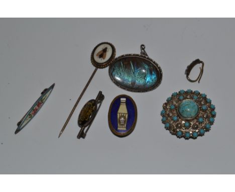 A hardstone stick pin, inlaid in coloured stones with insect;  an enamelled bar brooch;  a butterfly brooch;  etc 