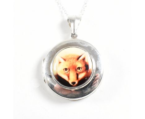 A contemporary 925 silver locket with enamel plaque of a fox. Weight approx 15.3g. Measures approx 3cm diameter (locket) / 42