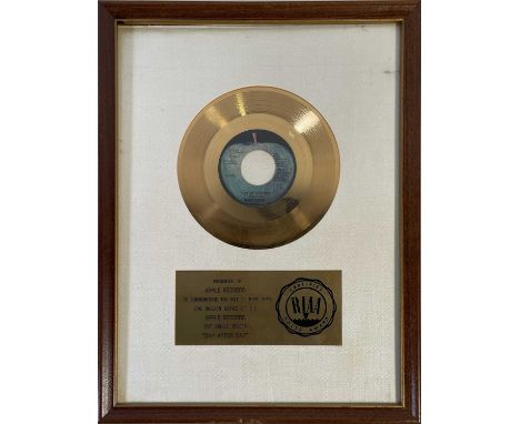 An original RIAA gold disc award presented to Apple Records to recognise sales of more than 1,000,000 copies of Badfinger 'Da