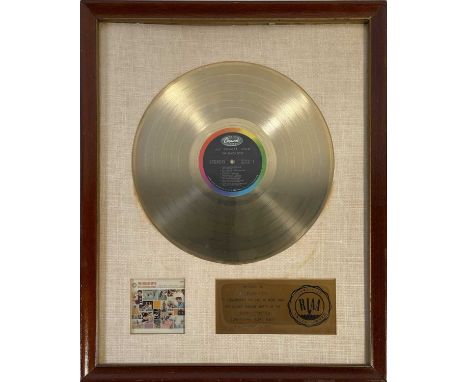 An original RIAA gold disc award, presented to The Beach Boys to recognise more than $1million dollars worth of sales of The 