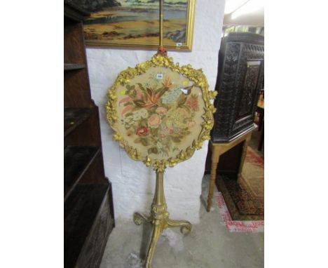 EARLY VICTORIAN GILT WOOD FIRE SCREEN, fine floral tapestry adjustable pole screen on gilt wood tripod base and vine bordered