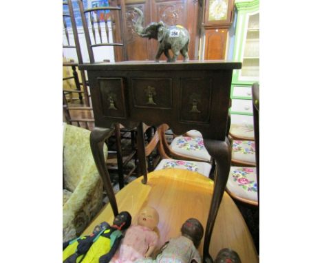 QUEEN ANNE DESIGN LOWBOY, cross banded figured walnut narrow lowboy of triple small drawers on slender cabriole legs and bras