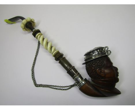 VICTORIAN PIPE, a fine Continental pipe with bowl carved as negroid head wearing medal and silver capped with carved ivory wr