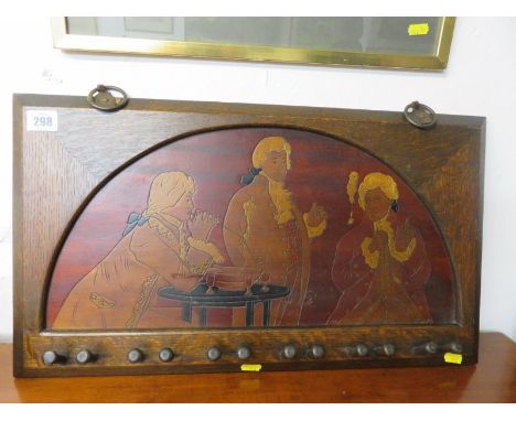 EDWARDIAN POKERWORK PIPE RACK with coloured panel of gentlemen smoking 