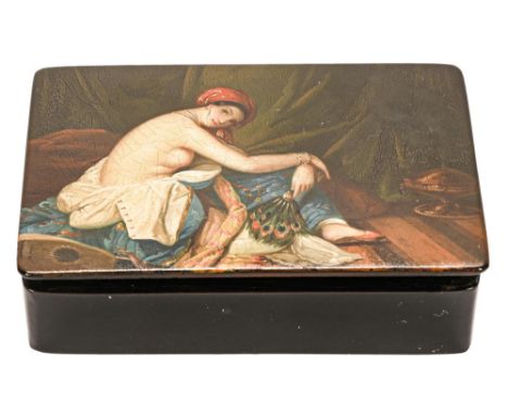 A German painted papier mache snuff box, Stobwasser's Fabrik, Braunschweig, c1840, the lid painted with a semi naked fair ski