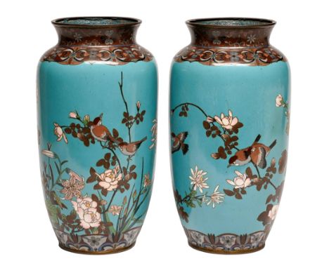 A pair of Japanese cloisonne enamel vases, Meiji period,&nbsp;of shouldered form decorated with birds and flowers on a blue g