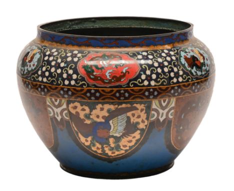 A Japanese cloisonne enamel jardiniere, Meiji period, with alternating lappet shaped reserves of phoenix and dragon a blue gr