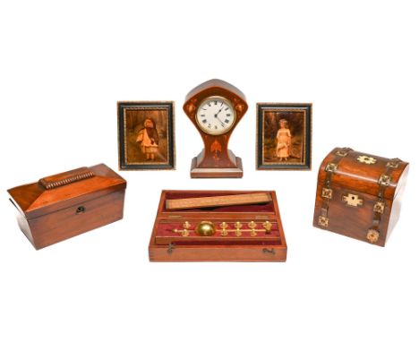 An Edwardian art nouveau inlaid mahogany mantel timepiece with French movement, 23cm h, a Victorian walnut tea caddy with ivo