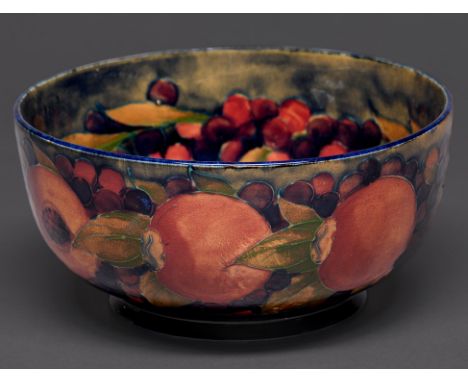 A Moorcroft Pomegranate bowl, c1918-1926, 19cm diam, impressed marks, painted signature  Glaze to the interior slightly craze