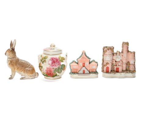 A cold painted white terracotta model of a hare, late 19th c, the head detachable, 21.5cm h, two Staffordshire cottage or cas
