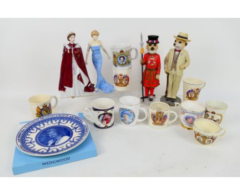 A Royal Worcester figure depicting Queen Elizabeth II, 80th birthday commemorative, a Royal Doulton figure depicting Diana Pr