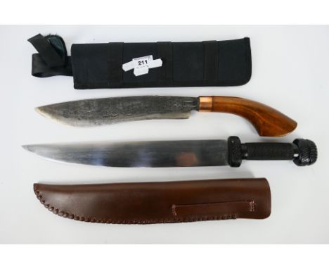 A Malaysian Parang knife with wooden handle and a Viking style Seax or Scramasax with 35 cm (l) blade. [2]. [W].Note: This lo