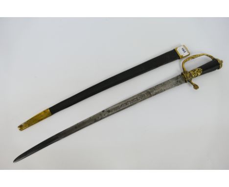 An antique continental hunting sword, no maker's marks noted with brass guard and pommel decorated with hunting scenes, the b